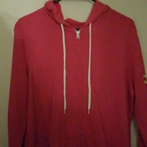 A pink zip up hoodie